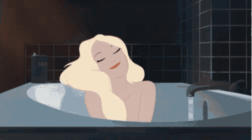 a woman is taking a bath in a bathtub next to a container that says salt