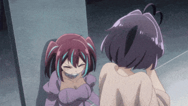 a girl with purple hair and blue streaks looks at herself in the mirror
