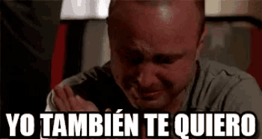 a man is crying with the words `` yo tambien te quiero '' written above him .