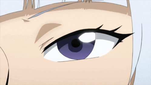 a close up of a person 's eye with a blue pupil