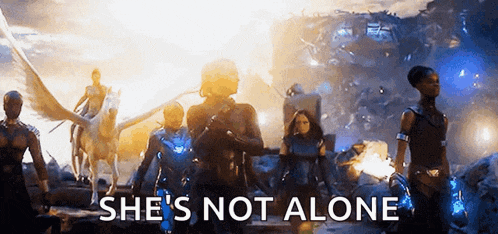 a group of people standing next to each other with the words `` she 's not alone ''