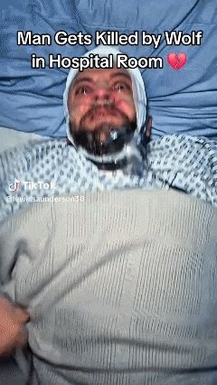a man laying in a hospital bed with a bandage on his head
