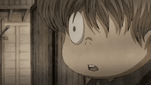 a close up of a cartoon character 's face with a surprised expression