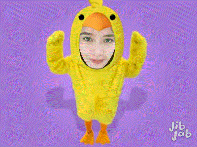 a woman in a yellow chicken costume with jib jab written on the bottom right