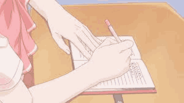 a girl is writing in a notebook with a pencil .
