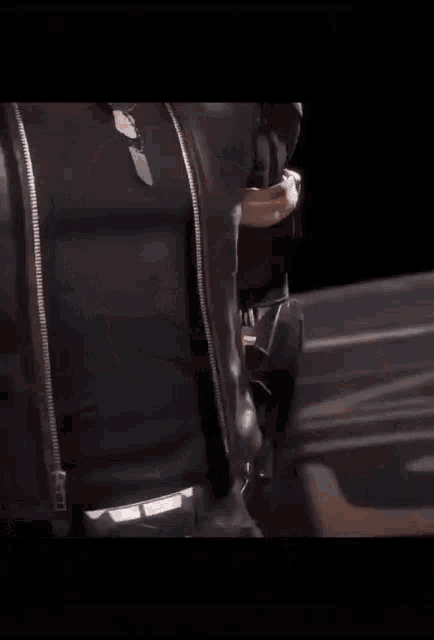 a man is smoking a cigarette while holding a gun with smoke coming out of his mouth