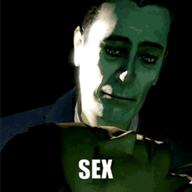 a man in a suit is holding a woman 's head and the word sex is on the bottom right