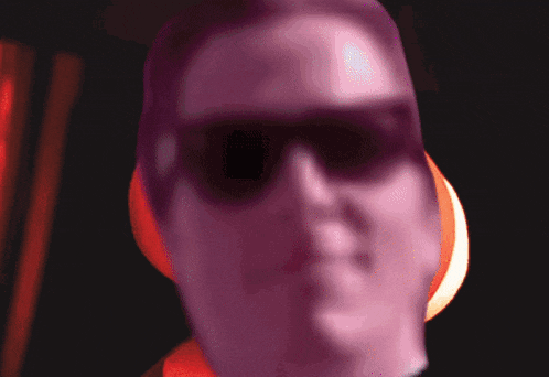 a pixelated drawing of a cartoon character with a red background