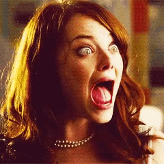 a woman with her mouth open and her tongue out