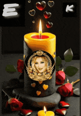a candle with a picture of a woman in the center