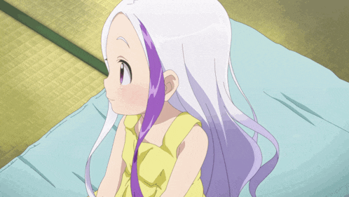 a little girl with long white hair and purple streaks