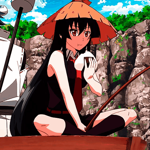 a girl with long black hair is wearing a straw hat and holding a white object