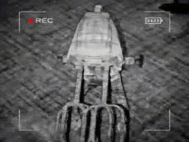 a black and white photo of a rocket with the word rec at the top