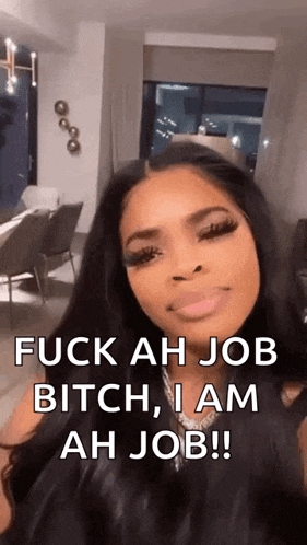 a woman with long hair is standing in a living room and says `` fuck ah job bitch , i am ah job !! ''