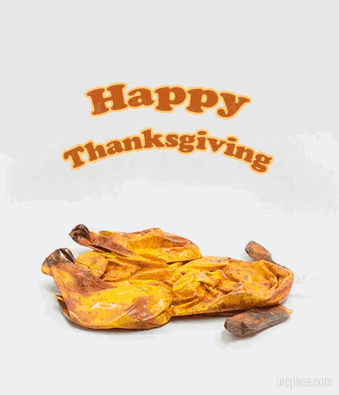 an inflatable turkey with the words " happy thanksgiving " above it
