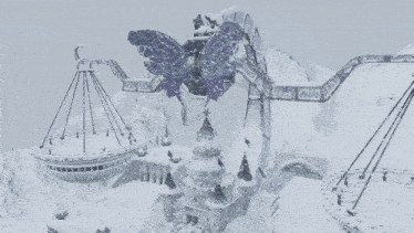 an aerial view of a snowy landscape with a butterfly sculpture in the middle