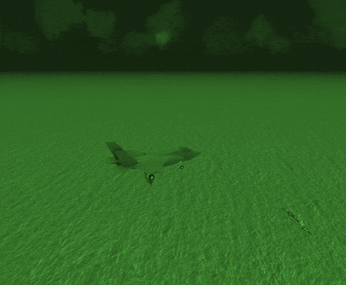 a jet is flying over a green field