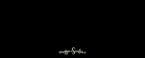 a black background with the word sicilia in yellow