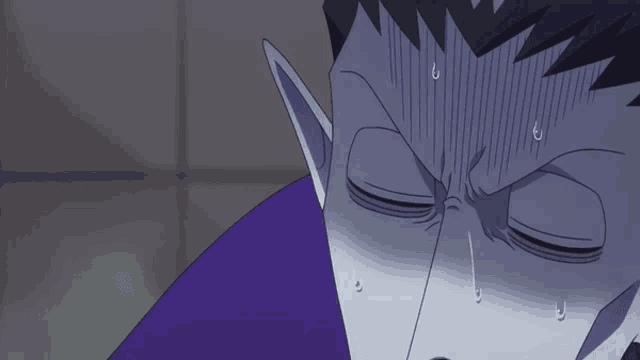 a close up of a person 's face with sweat dripping from their forehead