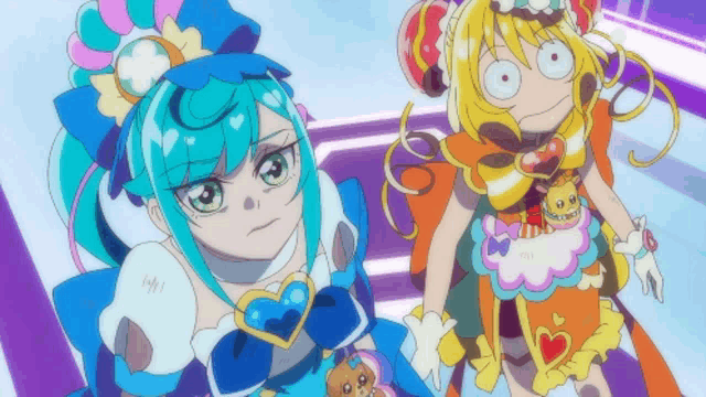 a cartoon drawing of a girl with a blue hair and a girl with yellow hair