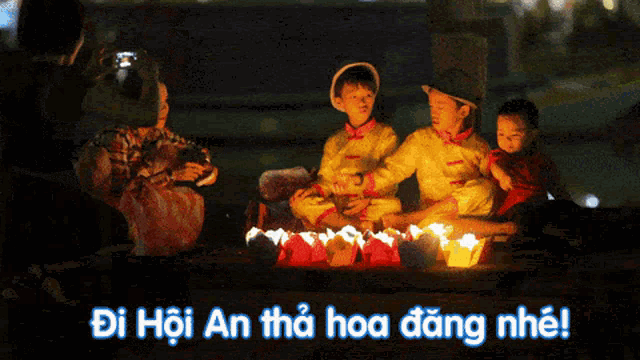a group of children are sitting around candles with the words di hoi an tha hoa dong nhe