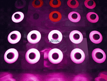 a purple background with pink circles and red circles with a circle in the middle that says ' welcome ' on it