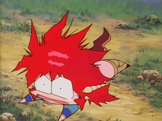 a cartoon character with red hair and a pink kiss on his face