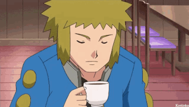 a man in a blue shirt is drinking from a white cup with korlinku written below him