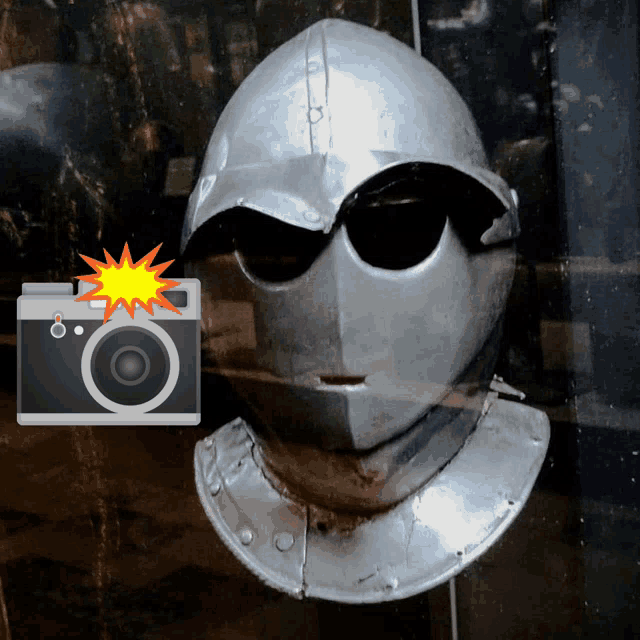 a picture of a knight 's helmet is being taken with a flash