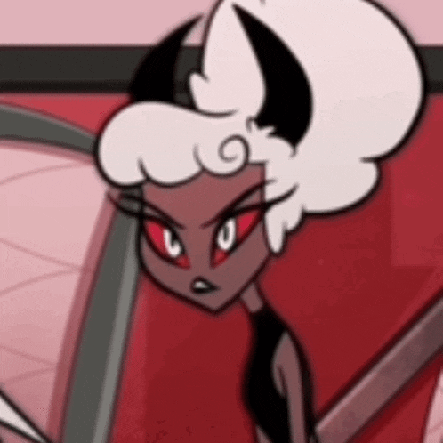 a close up of a cartoon character with horns and red eyes