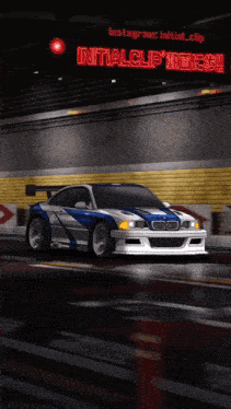 a bmw is driving down a street with a sign that says initialclip