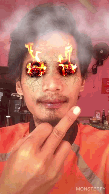 a man wearing an orange safety vest has smoke coming out of his eyes and the word monsterfy on the bottom