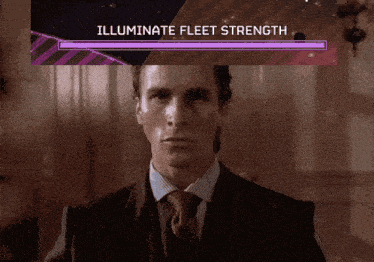 a man in a suit and tie stands in front of a screen that says " illuminate fleet strength "