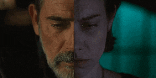 a man with a beard and a woman with a sad look on their faces
