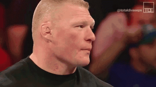 a close up of a man 's face in a wrestling ring .