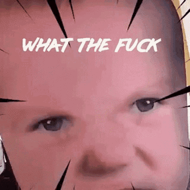 a close up of a baby 's face with the words `` what the fuck '' on it .