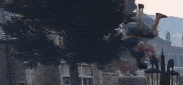 a man is doing a handstand in a video game while flying through the air .