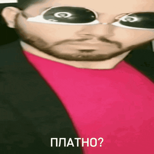 a man with a beard wearing sunglasses and a pink shirt says " platno " in russian