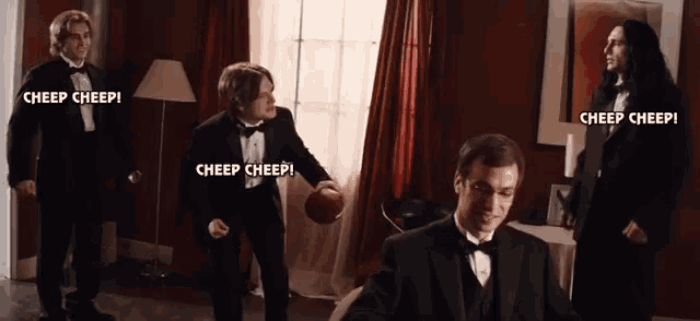 three men in tuxedos are standing in a room with the words cheep cheep written on the bottom