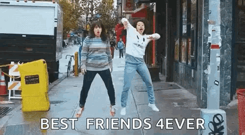 a couple of women are dancing on a sidewalk with the words `` best friends 4 ever '' written on the bottom .
