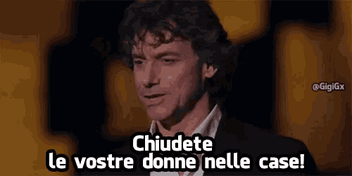 a man in a suit and white shirt says chiudete le vostre donne nelle case