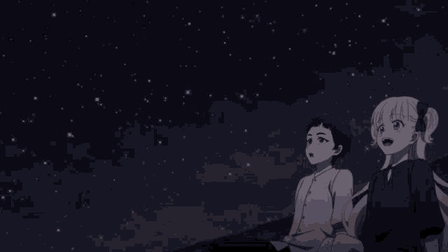 a boy and a girl are looking up at the stars in the night sky