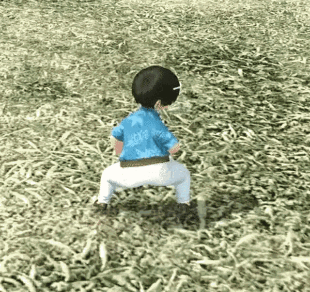 a cartoon character is squatting in the grass .