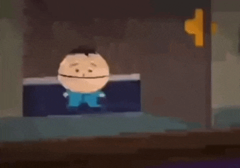 a cartoon character with a mustache is sitting on a bed .