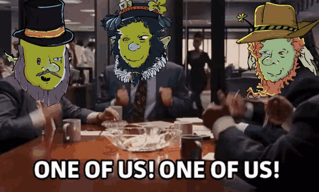 a group of people are sitting around a table with one of them saying one of us