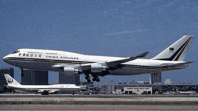 a china airlines airplane is taking off from an airport runway