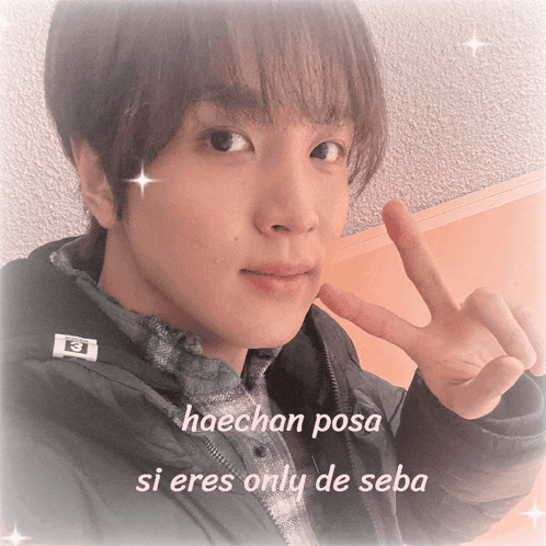a picture of a person with the words " haechan posa si eres only de seba " on the bottom