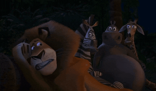 a group of cartoon characters including a lion and zebra