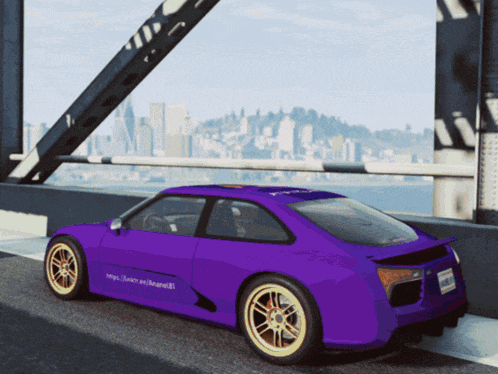 a purple car is parked on the side of a bridge with a city in the background