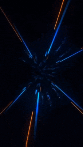 a blue and orange light beam is flying through a tunnel .